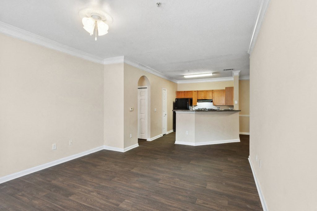 Living room with carpet and lighting at Longwood Vista Apartment Homes in Atlanta GA